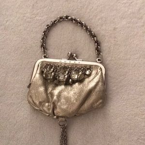 Gold embellished clutch